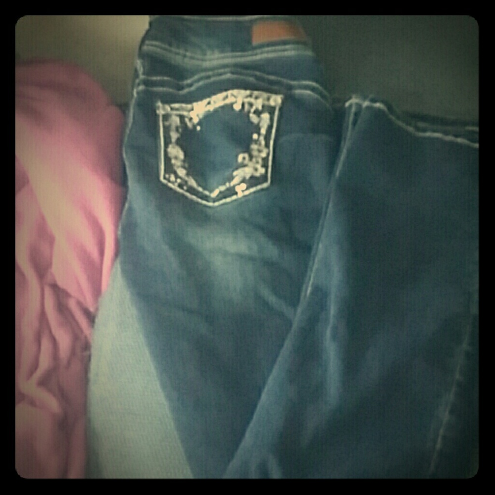 A pair of boot cut jeans.